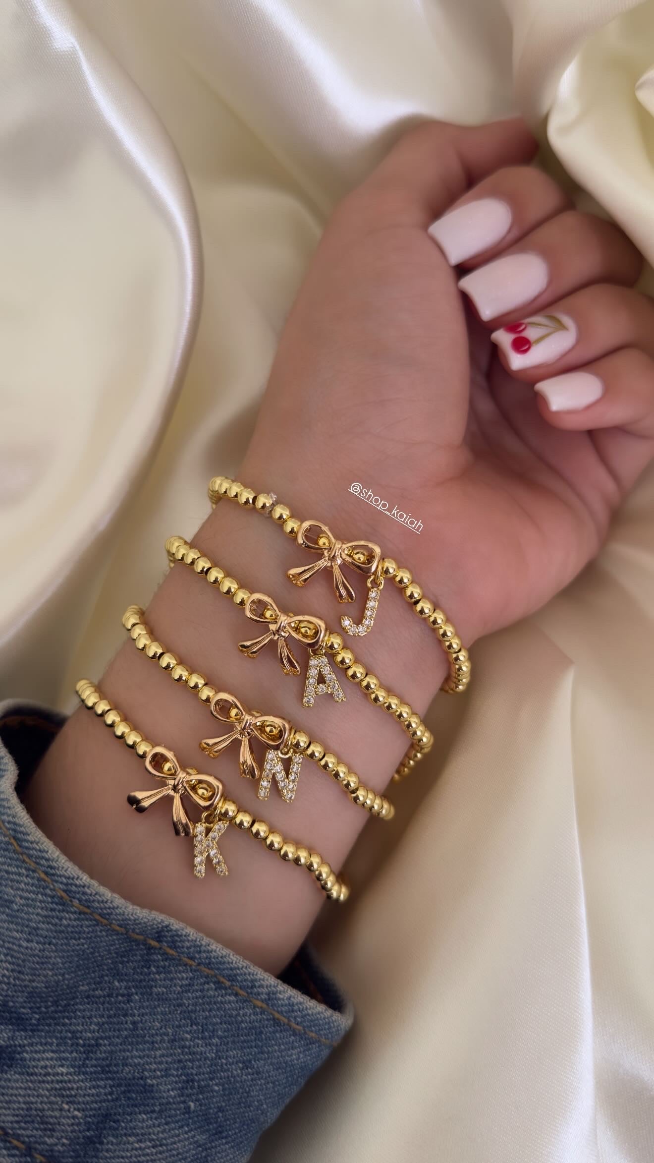BOW INITIAL BRACELET