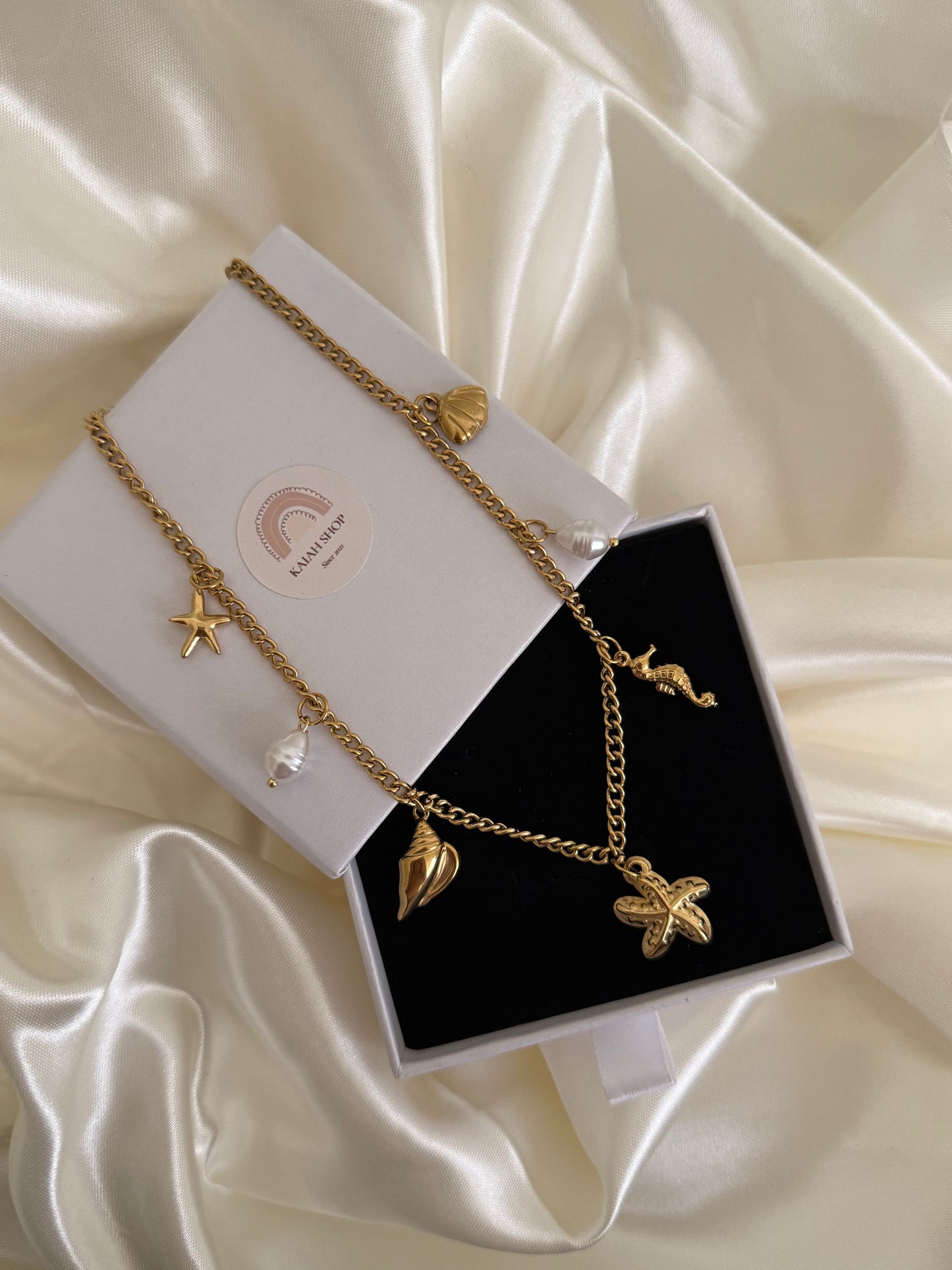 MUCH CHARM NECKLACE