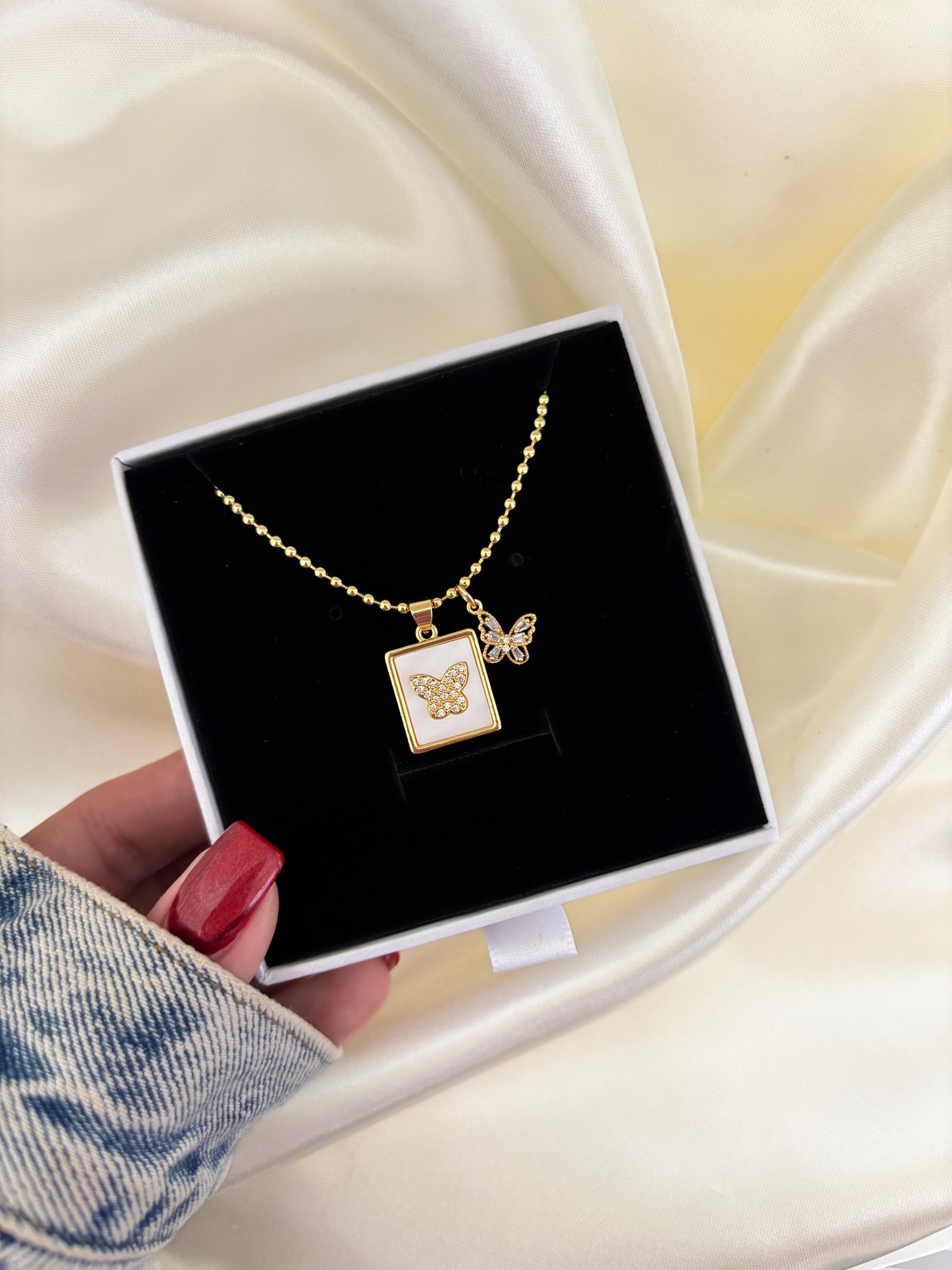 BUTTERFLY BALL NECKLACE